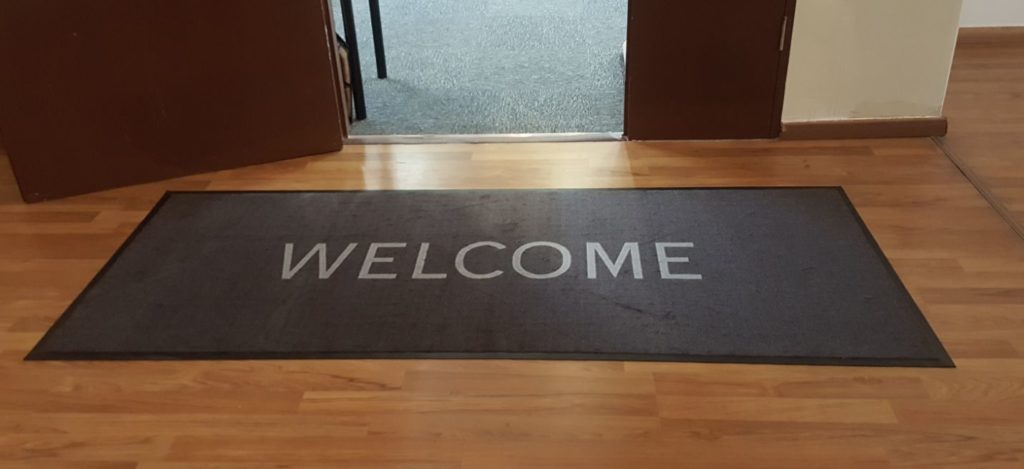 Logo mat Welcome